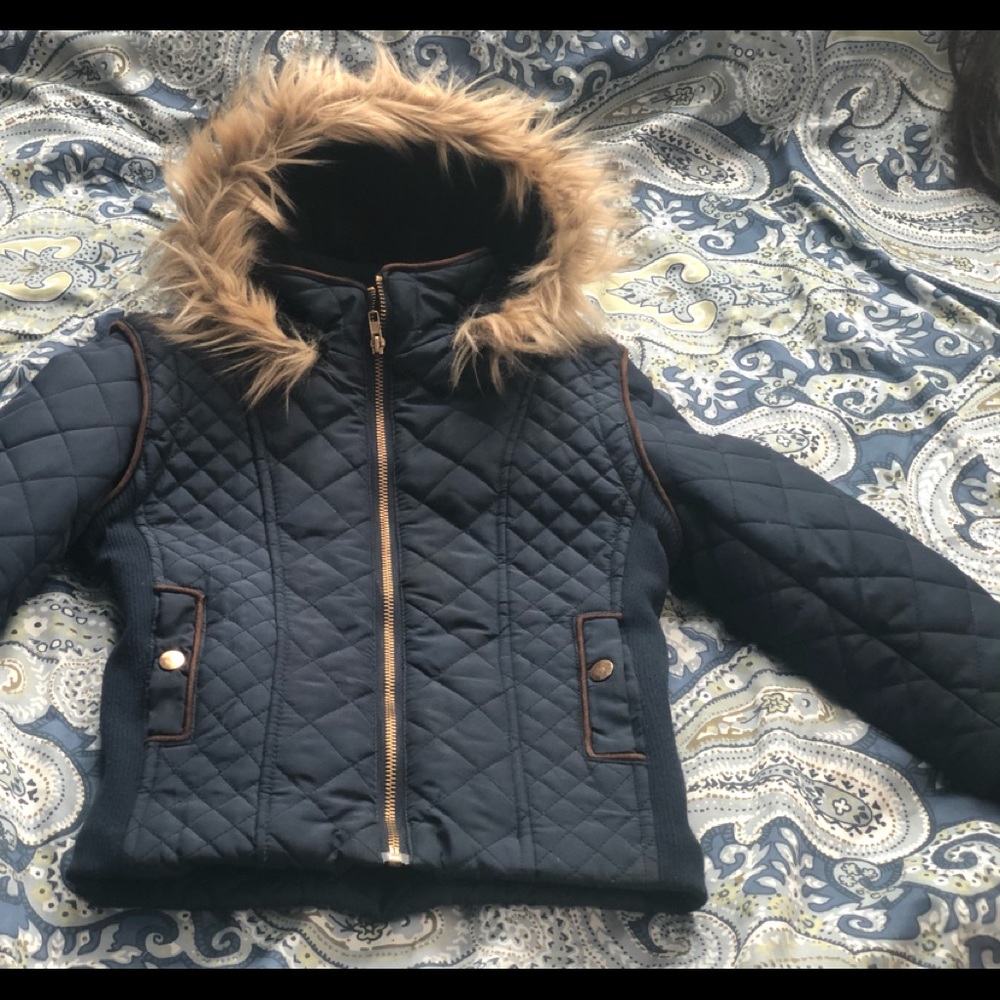 Winter jacket with fur hood and interior